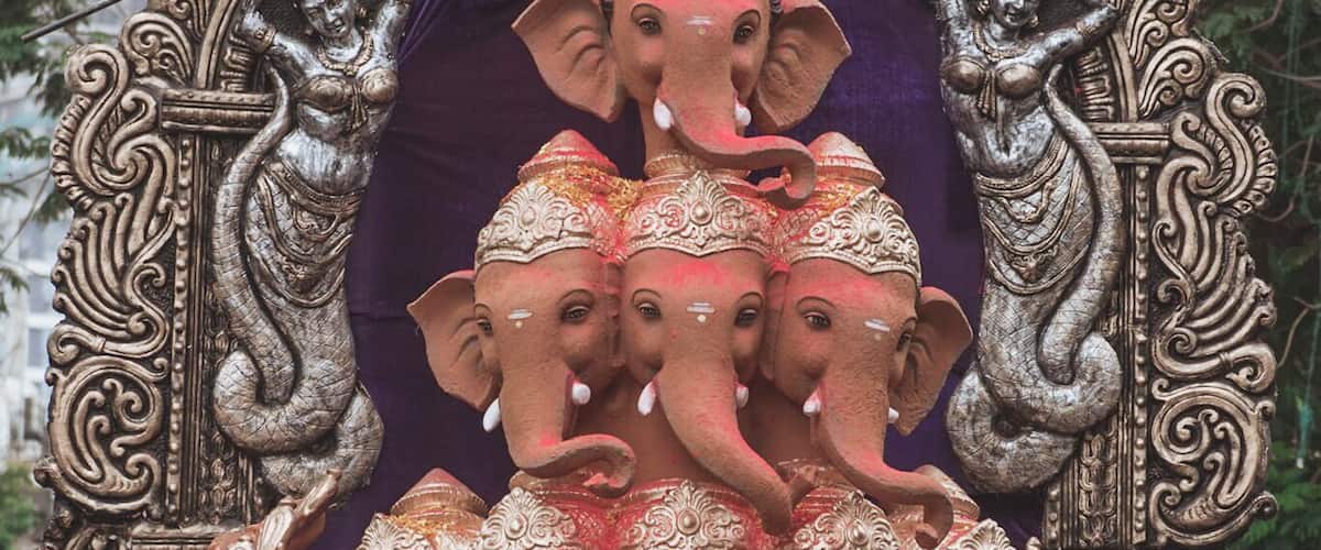 A symmetric idol of Ganesha with 9 heads.