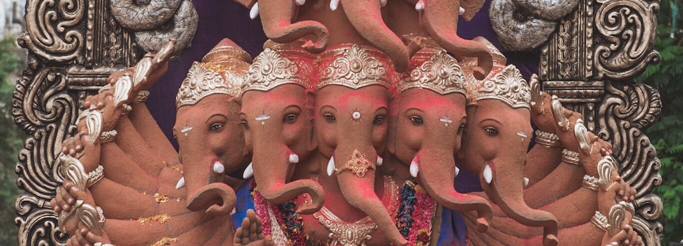 A symmetric idol of Ganesha with 9 heads.