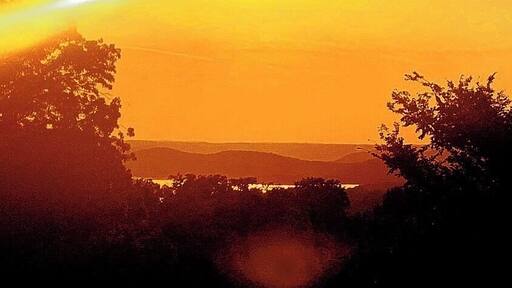 Beautiful yellow, orange, and red sunset at Tablerock Lake! #LifeAtExpedia