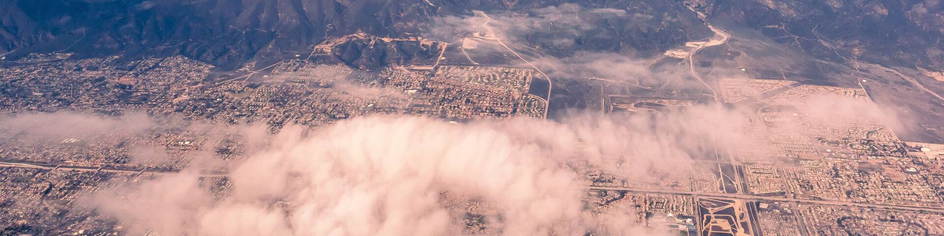 Aerial view of the San Gabriel Mountains outside of Los Angeles featuring Mt Baldy and Mt San Antonio's