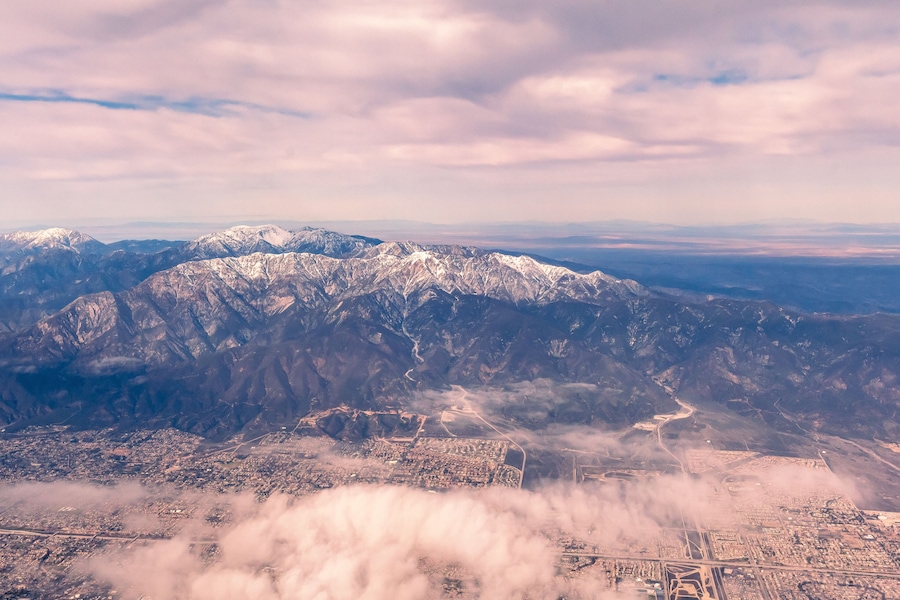 Aerial view of the San Gabriel Mountains outside of Los Angeles featuring Mt Baldy and Mt San Antonio's