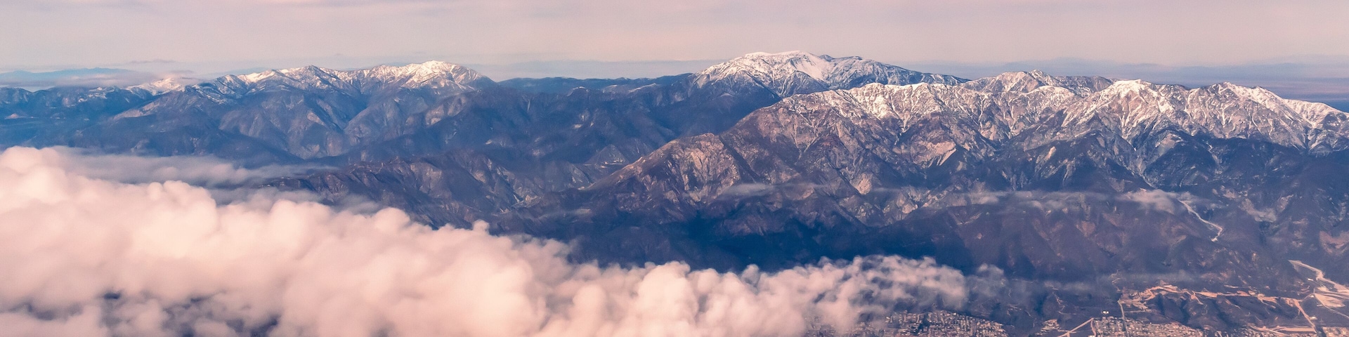 Aerial view of the San Gabriel Mountains outside of Los Angeles featuring Mt Baldy and Mt San Antonio's