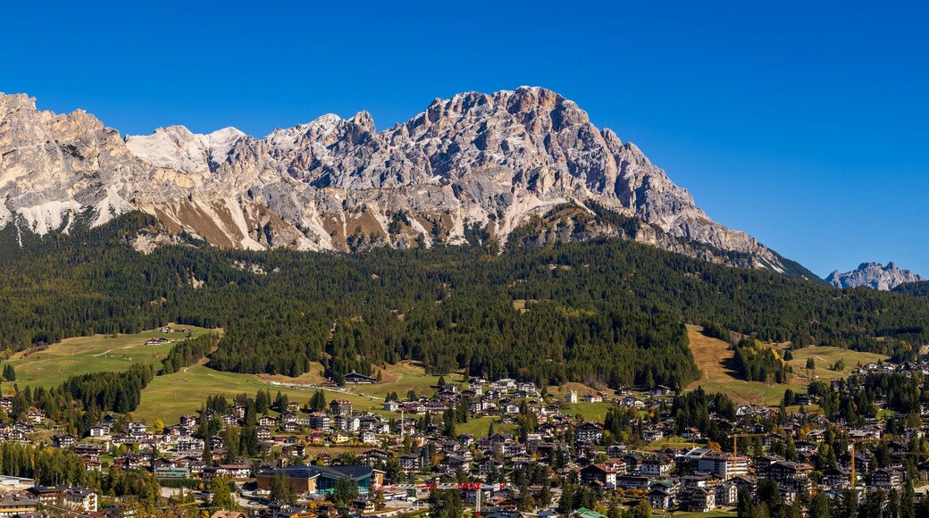 Cortina d'Ampezzo in the afternoon sun - view and rock ridge above the city