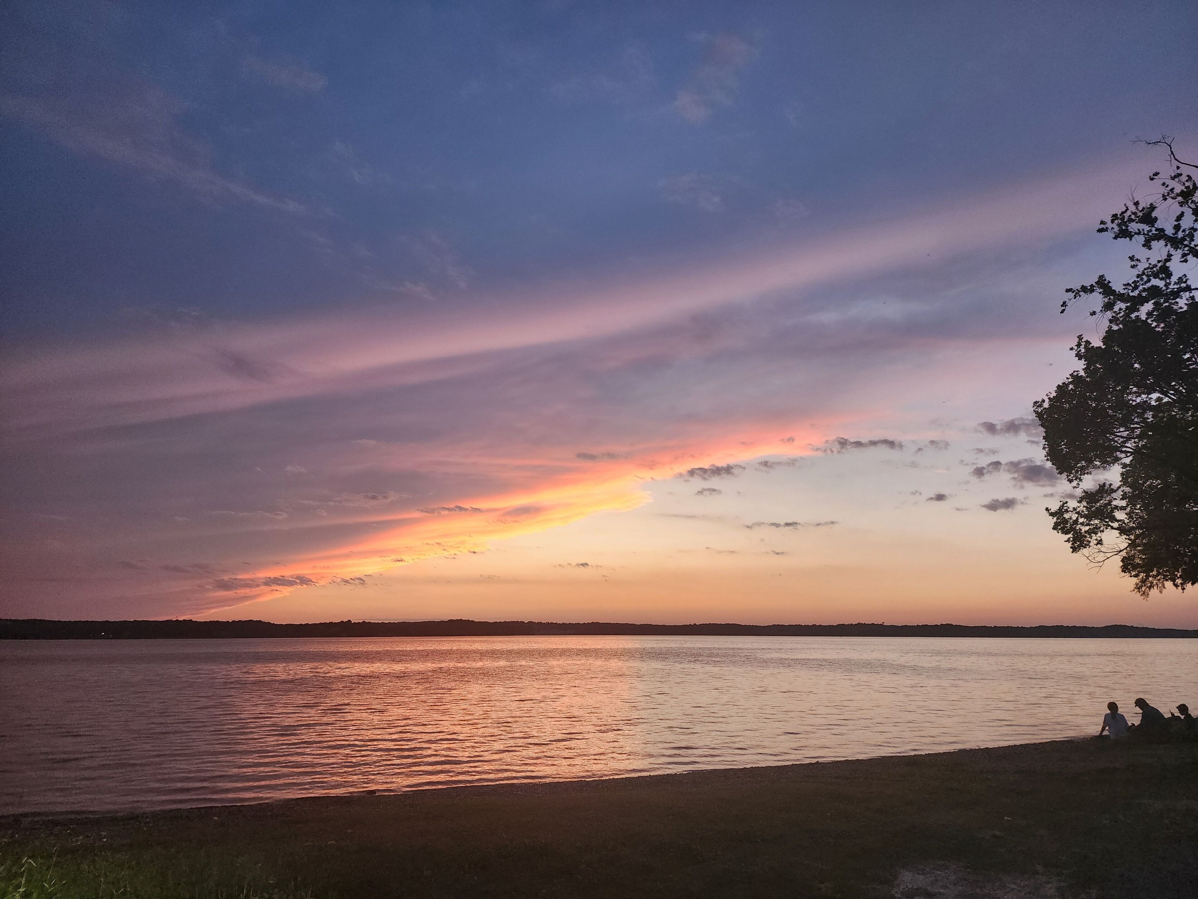 Tranquil lakeside sunset with vibrant colors in the sky.  Kentucky Lake, Tennessee