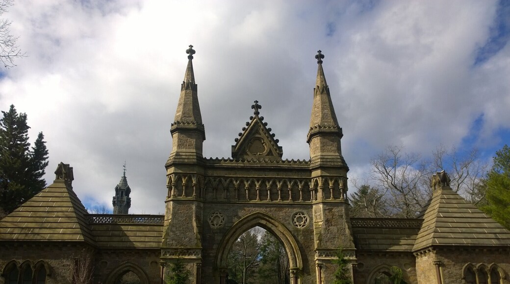 The impressive front main gate of Forest Hills Cemetery standing out against the #blue sky.
Built in 1848, Forest Hills Cemetery is a historic 275-acre cemetery, greenspace, arboretum and sculpture garden located in the Jamaica Plain neighborhood of Boston.