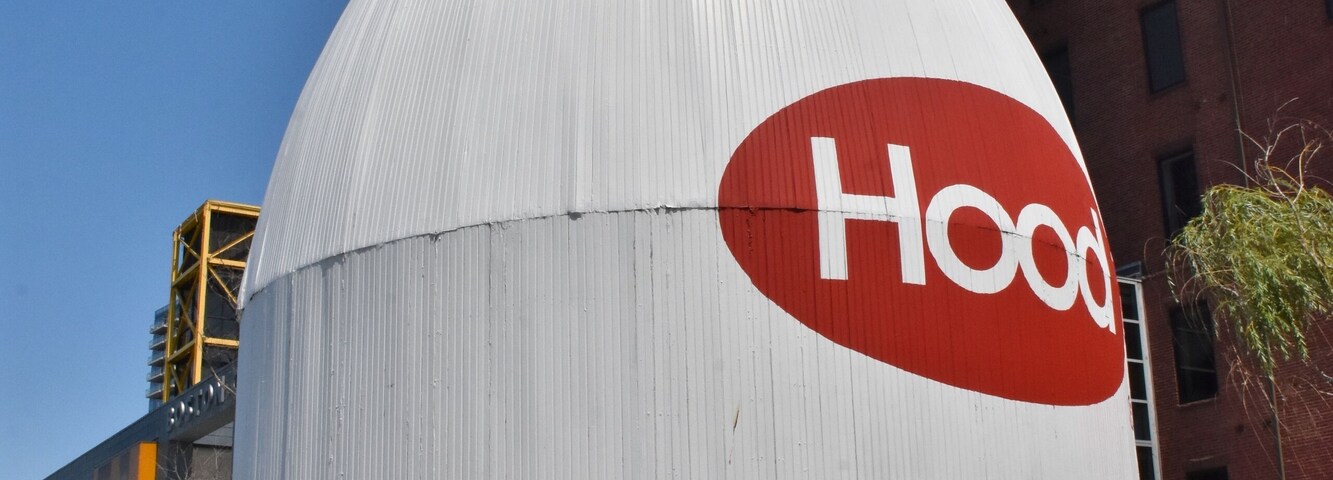 approx 40ft in height and sits just across the Fort Point Channel. Constructed in the 30's Arthur Gagner built the milk bottle next to his store to sell his homemade ice cream.I believe its now owned by the Childrens museum