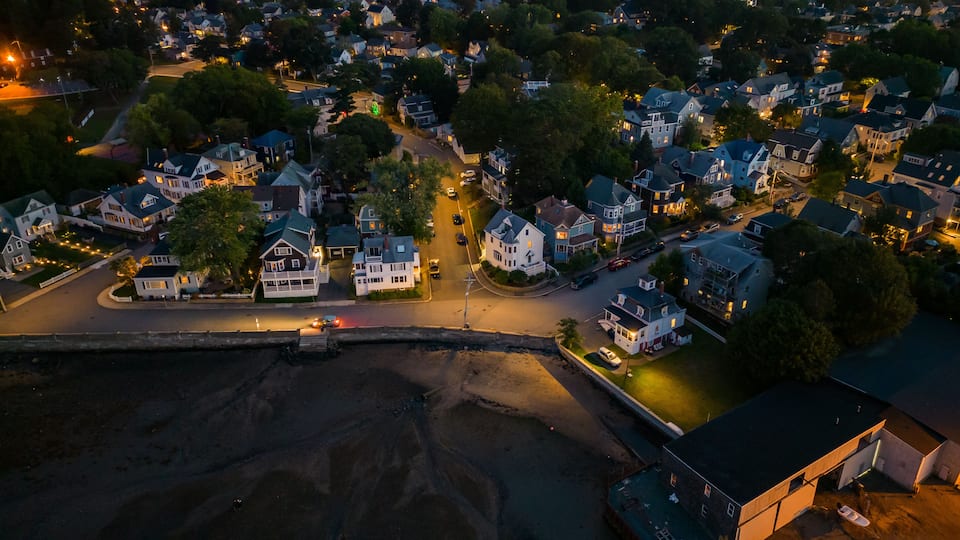 view of salem massachusetts at night from aerial drone