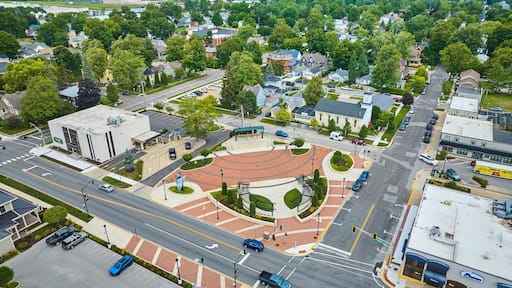 James Cultural Plaza aerial in Auburn with houses and church