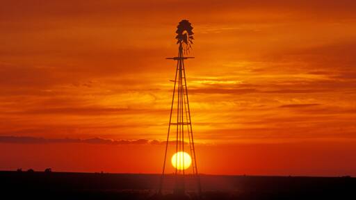 Windmill at sunset in Forgan, OK