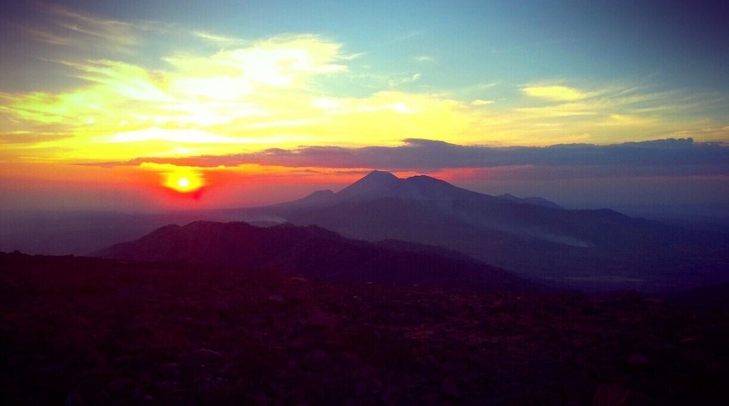 After hiking up the side of Telica Volcano just outside of Leon, Nicaragua, we all took a break to have a snack and watch the sun set behind the volcanic skyline. It was simply amazing! After the sun finally disappeared behind the horizon we hiked up to the edge of Telica's crater to stare down at the bubbling lava. #hiking