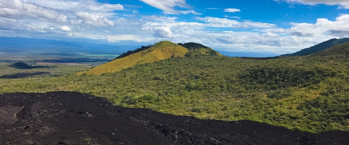 Hiked up this volcano and surfed down! 🏂