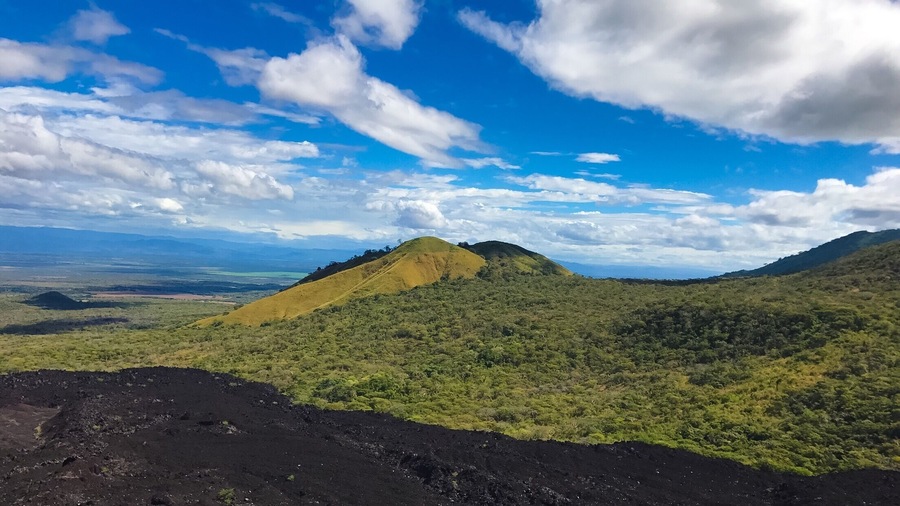 Hiked up this volcano and surfed down! 🏂