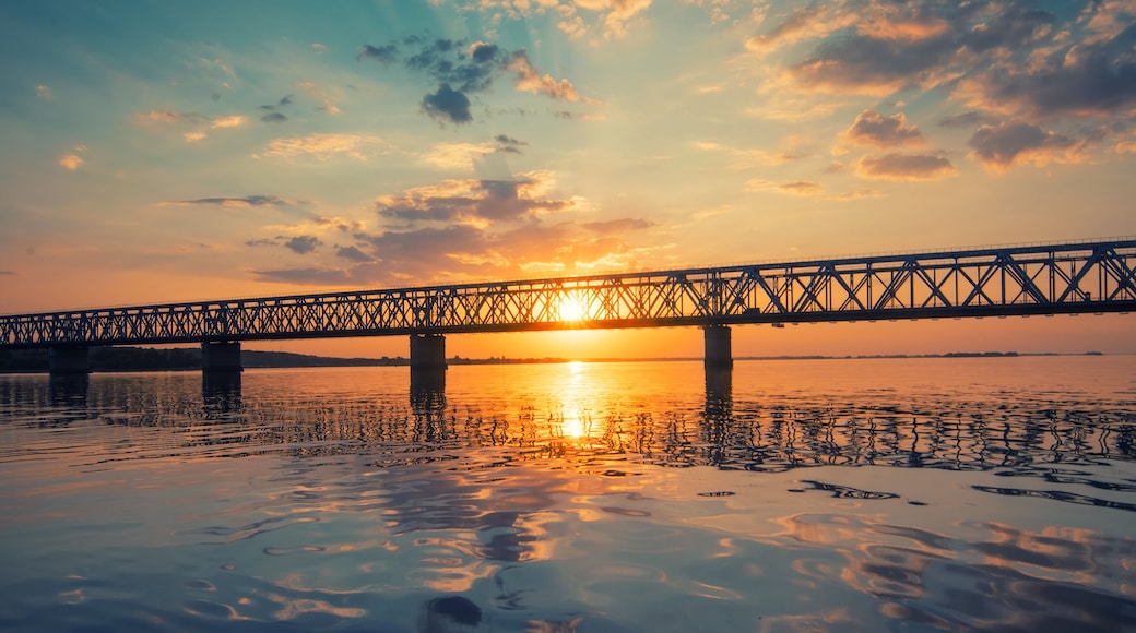 Amazing view to bridge across the Dnieper river, Cherkasy, Ukraine at sunset