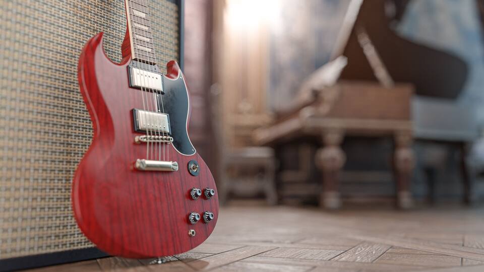 Red electric guitar in a beautiful old room