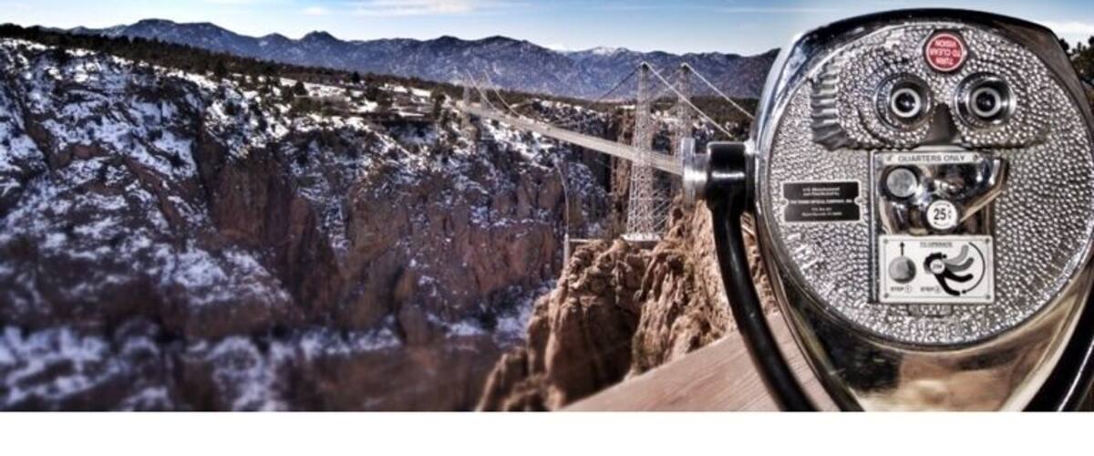 Royal Gorge is one of the world's highest suspension bridges. It hangs 955 feet above the Arkansas River. The bridge is 1,260 feet long with a wooden walkway. The bridge took 6 months for construction and was completed in November of 1929.