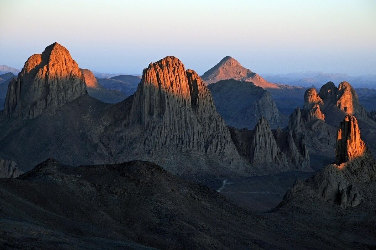 A rugged mountain range with prominent peaks and valleys.