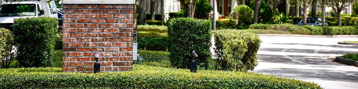 Entrance sign at Baldwin Park in Orlando, Florida. A tranquil, primarily residential community with tree-lined streets.