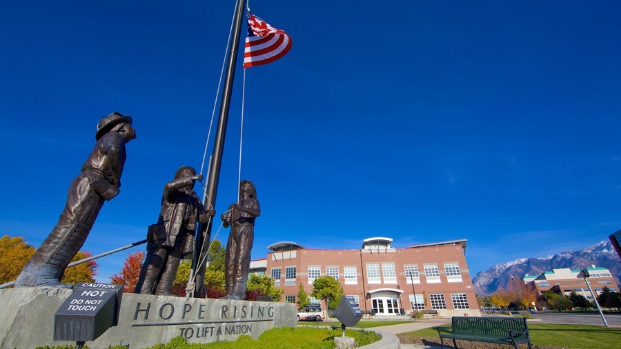 Sandy which includes a statue or sculpture, signage and a monument