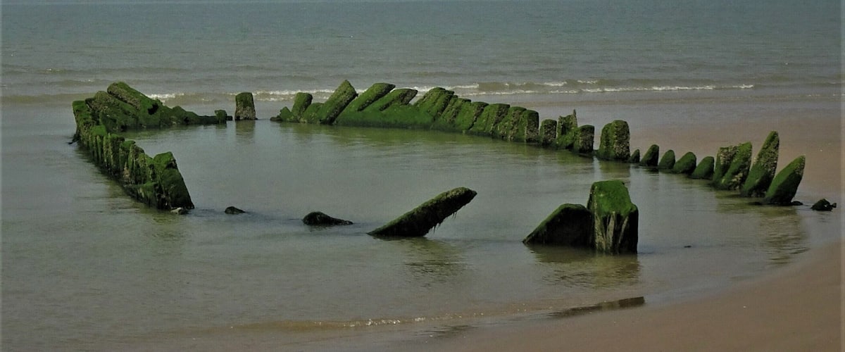 On the misty background: the metallic “Phare de Walde” (1859), an abandoned lighthouse, ‘lost’ on the beach between Gravelines and Calais. The lantern was destroyed by an explosion in 1953. The Phare de Walde materializes the boundary between the North Sea and the (English) Channel. #OpalCoast #BeachTips #LocalSecrets #History