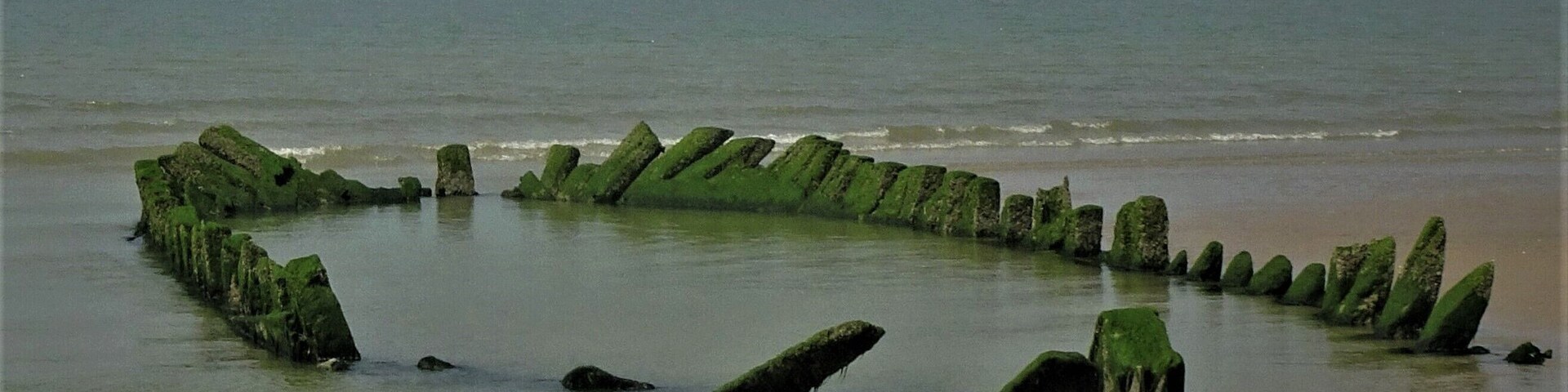 On the misty background: the metallic “Phare de Walde” (1859), an abandoned lighthouse, ‘lost’ on the beach between Gravelines and Calais. The lantern was destroyed by an explosion in 1953. The Phare de Walde materializes the boundary between the North Sea and the (English) Channel. #OpalCoast #BeachTips #LocalSecrets #History