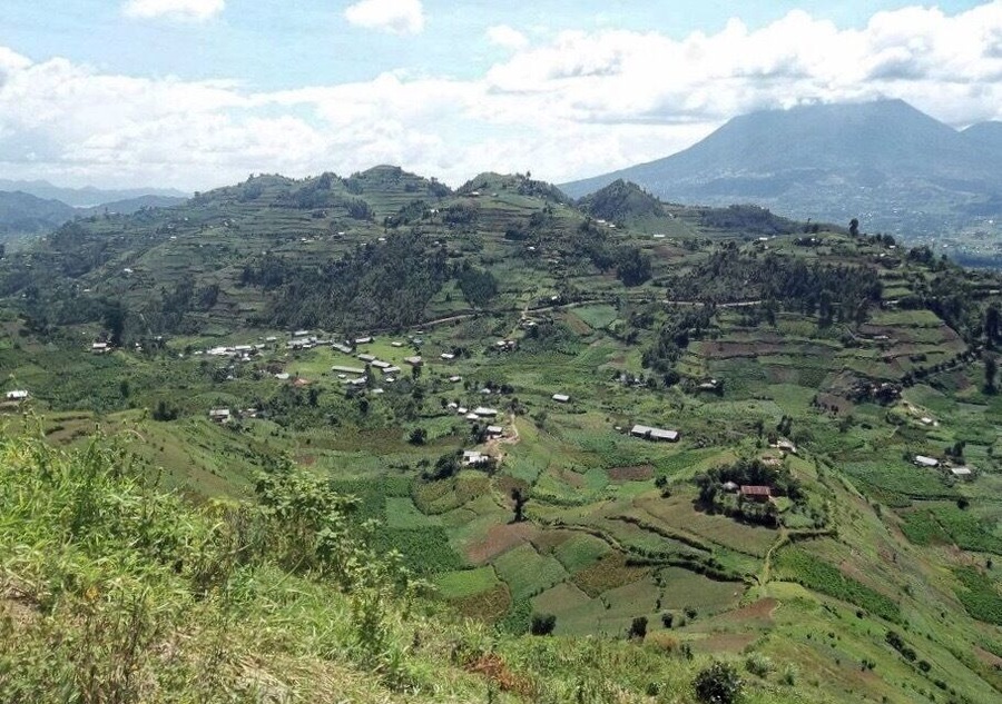 Surrounding area with Mt.Gahinga in the background. Uganda is amazing, every foot of land is used to plant food. Every mountain side is patchworked with squares of gardens.
#Mountians