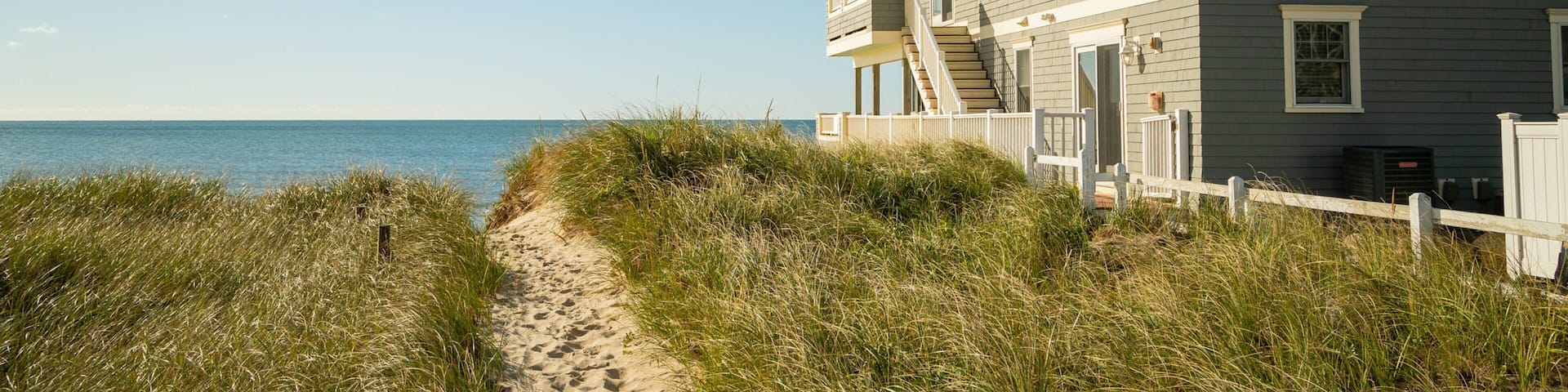 Dennis Port which includes a coastal town and general coastal views