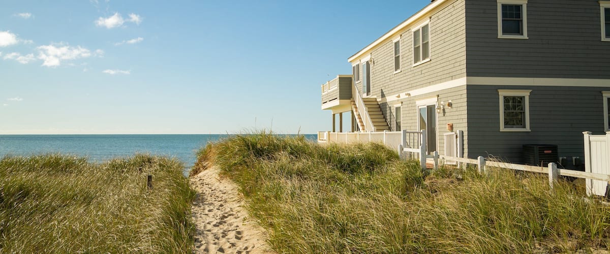 Dennis Port which includes a coastal town and general coastal views