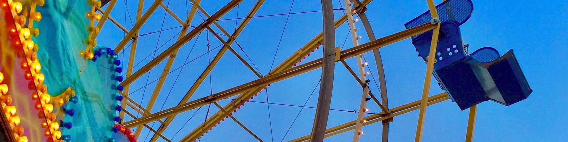 Rides, games, food, soft sand, and calm waters can be found at the Santa Cruz Boardwalk. Also, as an extra, summer brings free movie nights on the beach as well as free beach concerts every Friday Night. 70s, 80s, and 90s bands that originated from the Bay Area and California come back to perform. In the last several years we watched Pablo Cruz, The Fixx, Gin Blossoms, Berlin, and others while relaxing in our beach chairs and toes in the sand.
This picture was taken in the evening while riding a few of the rides.
#BVSBlue #TroveOnTuesday
#MyBackyard
#Trovember