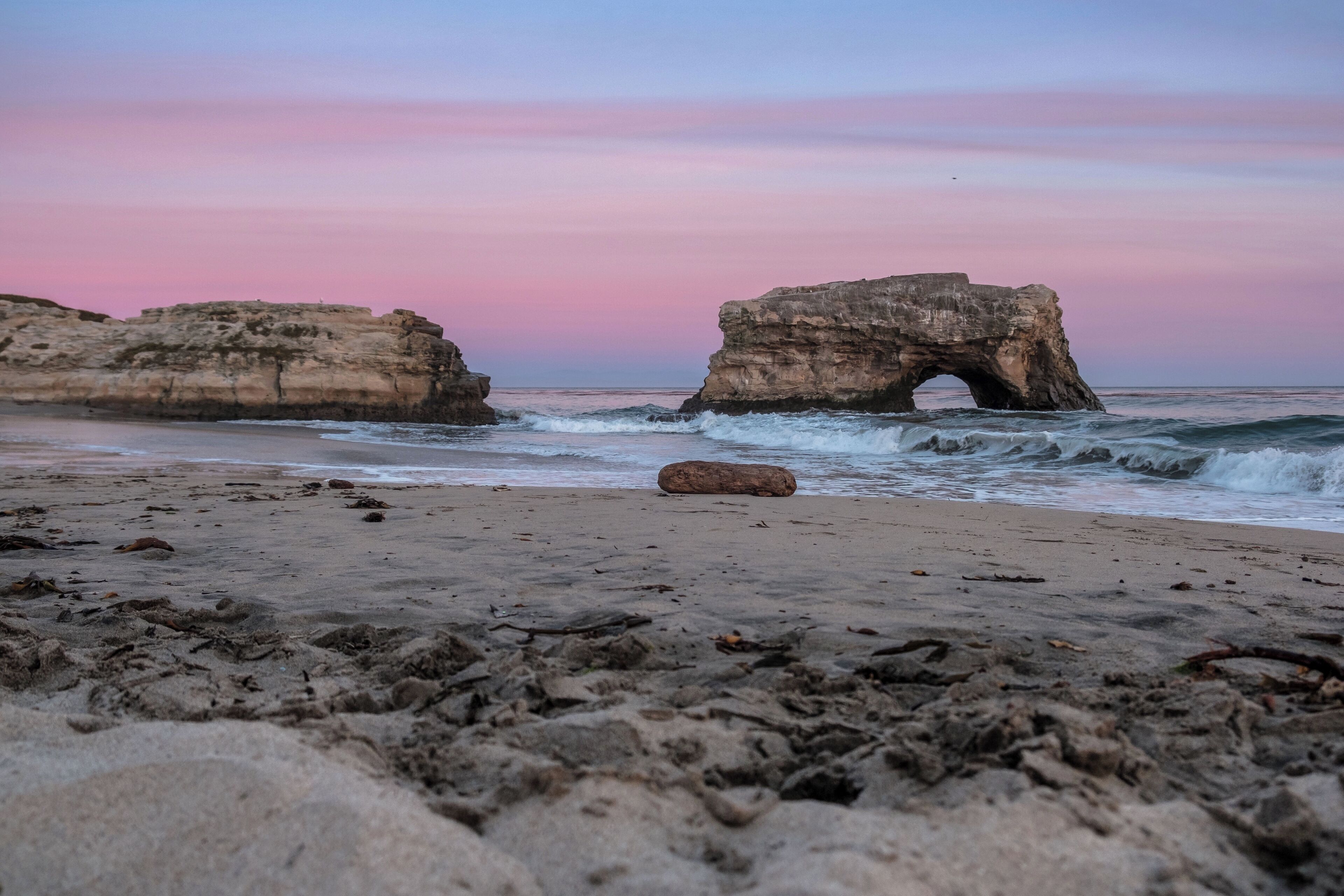 Natural Bridges State Beach is named for the natural arch in the huge rock located in the shore break here. This is one of the most photographed beach icons in the state of California.

#localsecrets