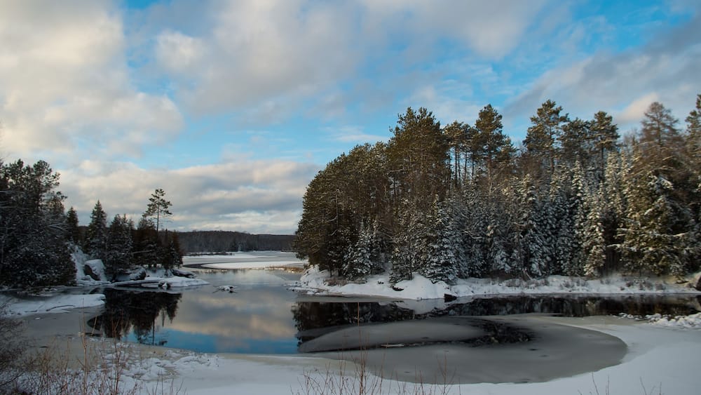 Lake in Winter on a Blue Sky White Cloud Day