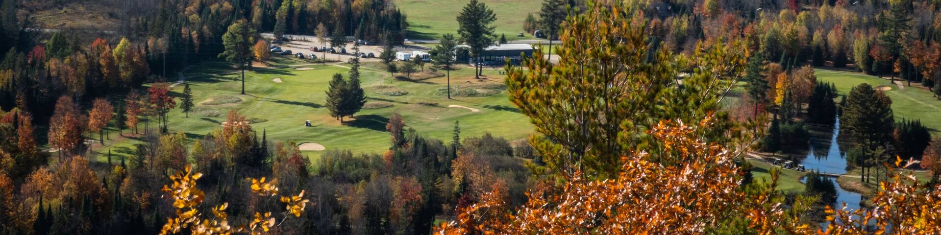 Bird's eye view lookout over fall color trees and golf course in Bancroft, Ontario, Canada