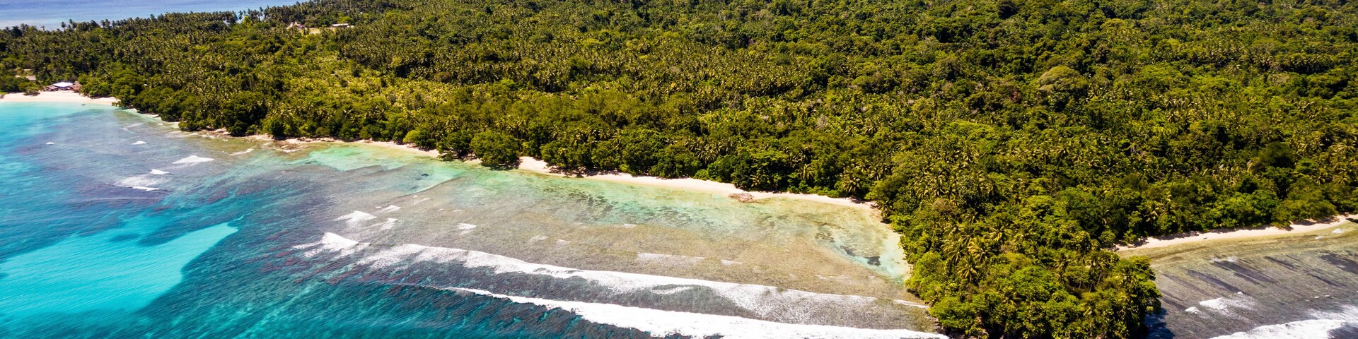 Aerial Drone View of Coast of Musho Island, Wewak East Sepik Province, Papua New Guinea.