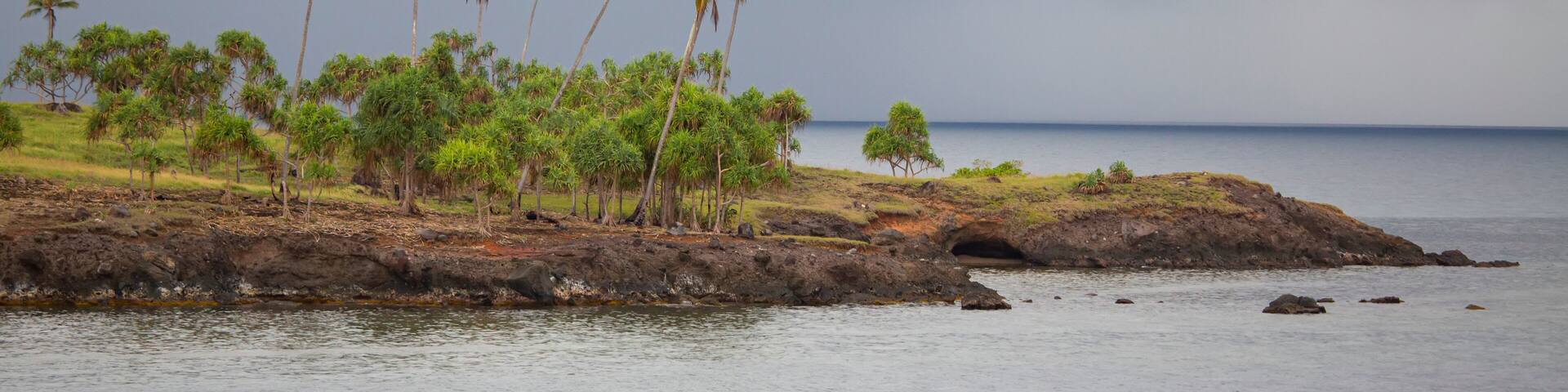Stormy skies over the Tufi peninsular on the Cape Nelson peninsula; Tufi, Oro Province, Papua New Guinea