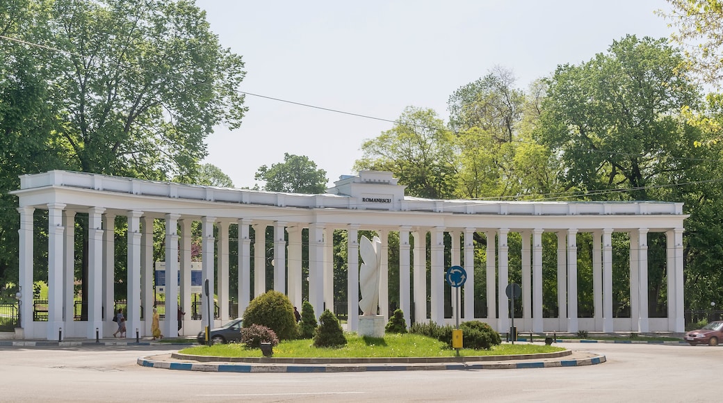 The architecture with white columns at the entrance to the city park Parcul Nicolae Romanescu, Craiova, Romania
