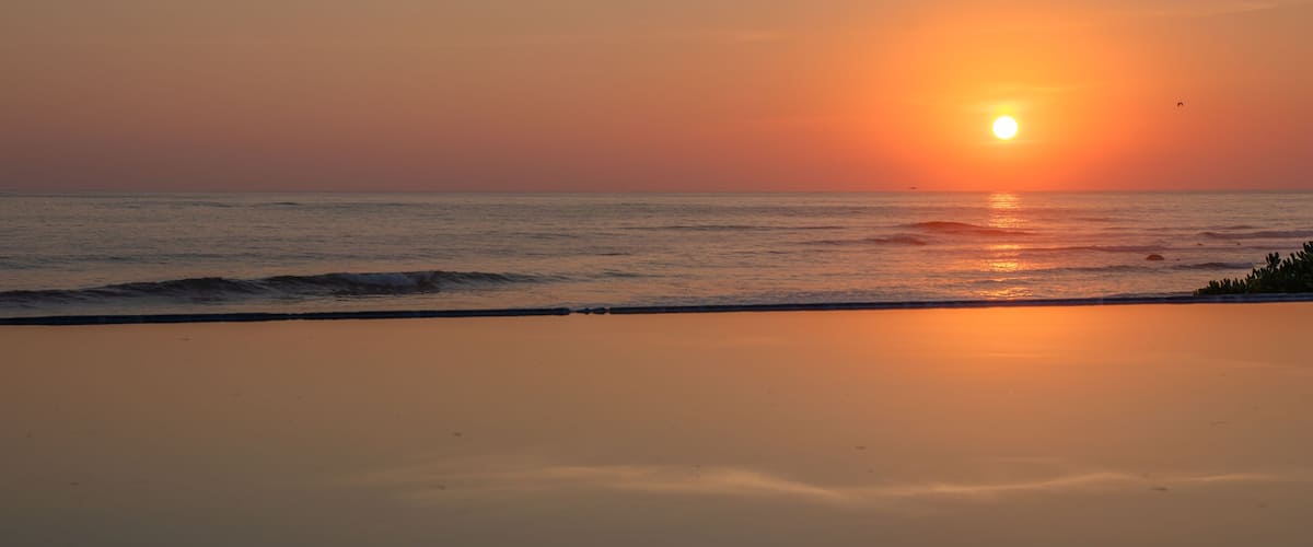 Sunset reflection at punta de mita beach in Nayarit