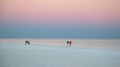 Pensacola Beach showing general coastal views, a beach and a sunset