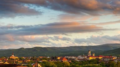 Majestic sunset with colorful clouds above the city of Caransebes