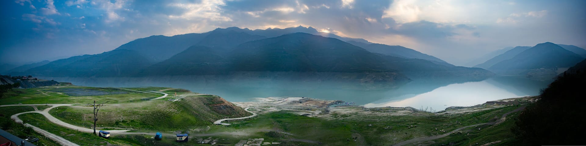 panorama view Sunrise at Tehri mountains. Scenery sunrise over Tehri Lake, Uttarakhand. Tehri Dam, the tallest dam in India and Tehri dam is Asia's largest man-made lake.