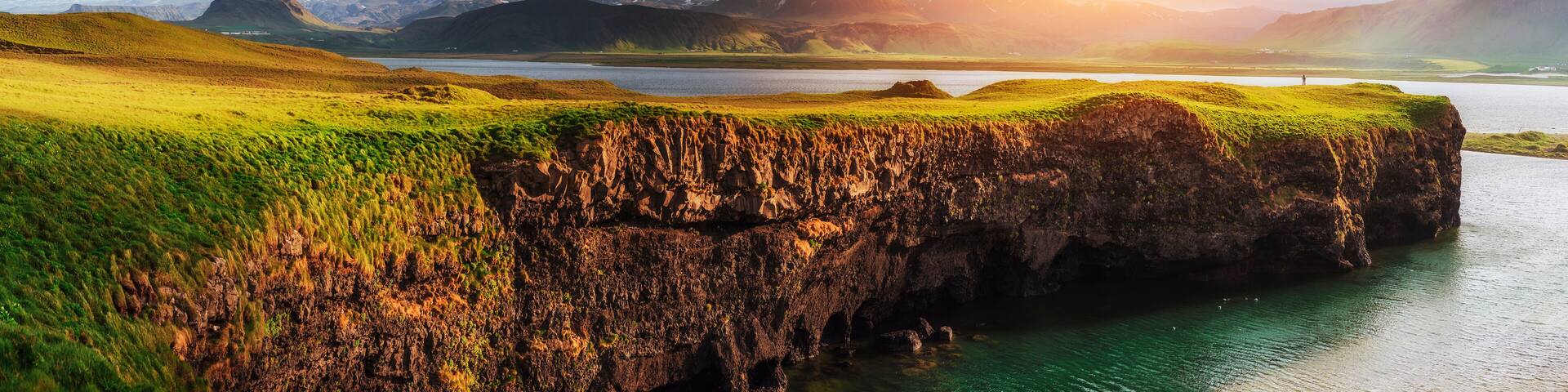 Reynisfjara black sand beach in Iceland. Reynisfyal Mountains