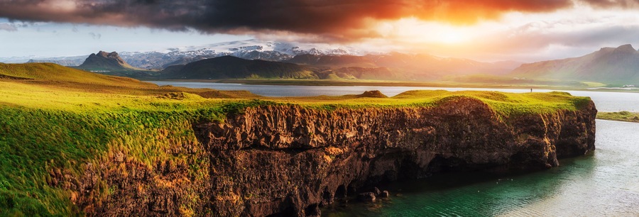 Reynisfjara black sand beach in Iceland. Reynisfyal Mountains
