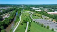Aerial shot of a gorgeous landscape at Etowah River Park with lush green trees and grass in Canton Georgia USA