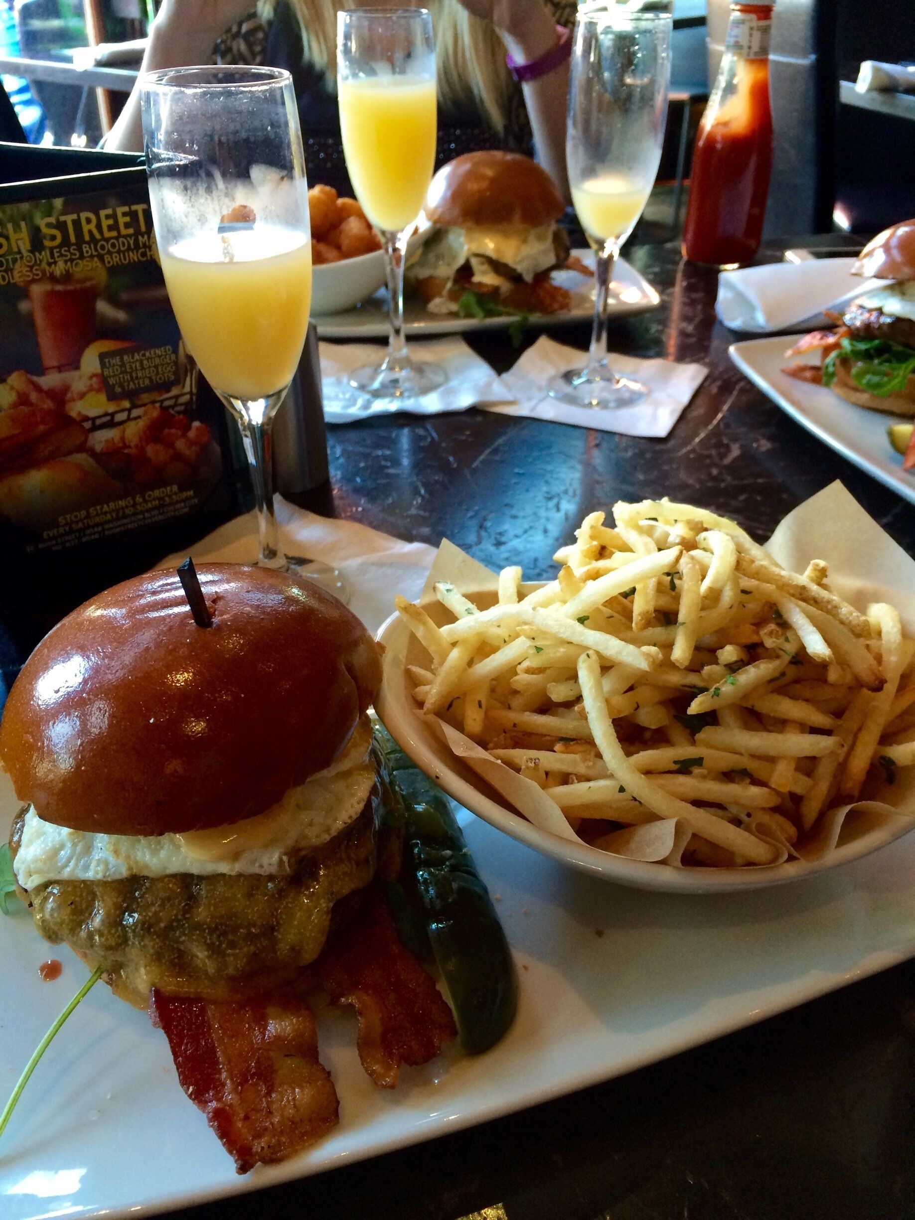 Blackened Redeye Breakfast burger, truffle parmesan fries and unlimited mimosas!