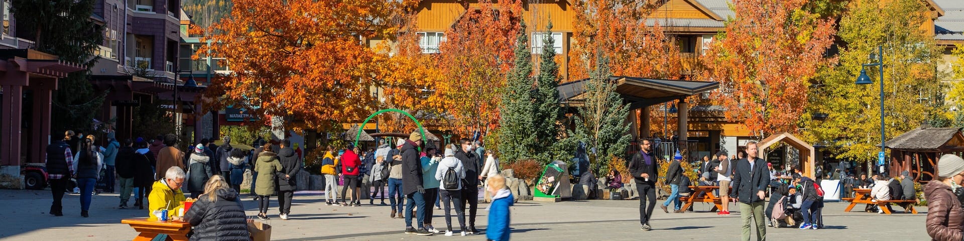Whistler Olympic Plaza which includes a square or plaza, street scenes and a small town or village