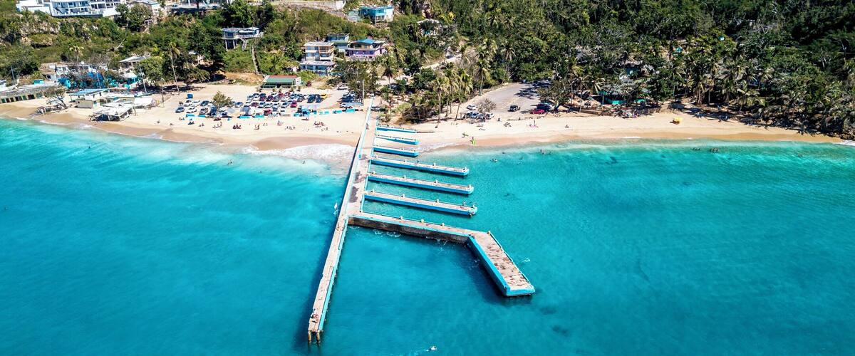 Crash Boat beach in Aguadilla, Puerto Rico is one of my favorite spots when I am in Puerto Rico. The beach took a massive hit from Hurricane Maria, but the locals banded together and did a great job clearing debris. The dark lines in the water are piers that sank during the storm. They make for great snorkeling as the water is crystal clear and the sea life is plenty. #BeachTips #bvsblue