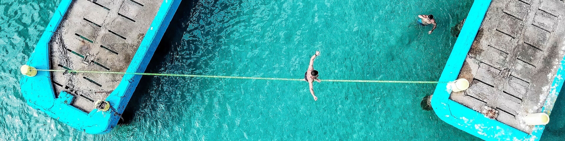 Crash Boat beach in Aguadilla, Puerto Rico is one of my favorite spots when I am in Puerto Rico. The beach took a massive hit from Hurricane Maria, but the locals banded together and did a great job clearing debris. Some creative kids set up a slack line over the water for all to try. #bvsblue