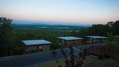 The Iris Inn, a luxury Shenandoah bed and breakfast, is the perfect base to explore Virginia's Blue Ridge mountains. Located 30 minutes from Charlottesville, the Inn is close to nearly 30 wineries and is within a few minutes drive to the southern entrance of Shenandoah National Park. Owners Dave and Heidi Lanford warmly welcome visitors to their cozy mountainside inn with gourmet breakfasts and a complimentary nightly happy hour. The eco-friendly B&B also offers an electric vehicle charging station.