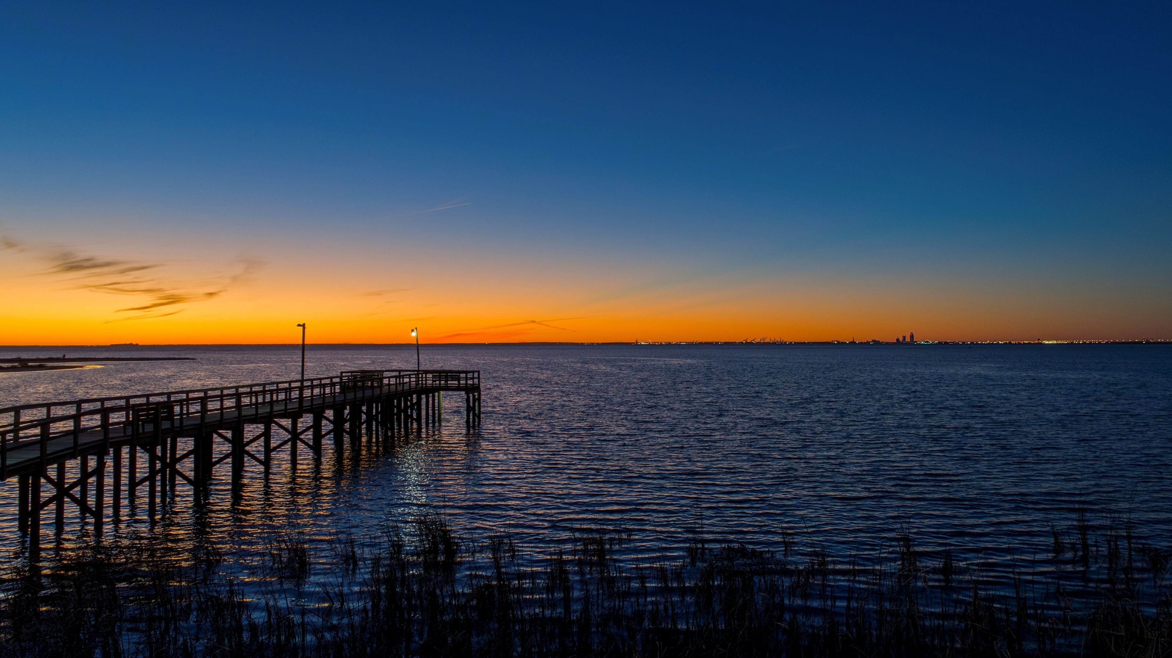 Pier on Mobile Bay at sunset