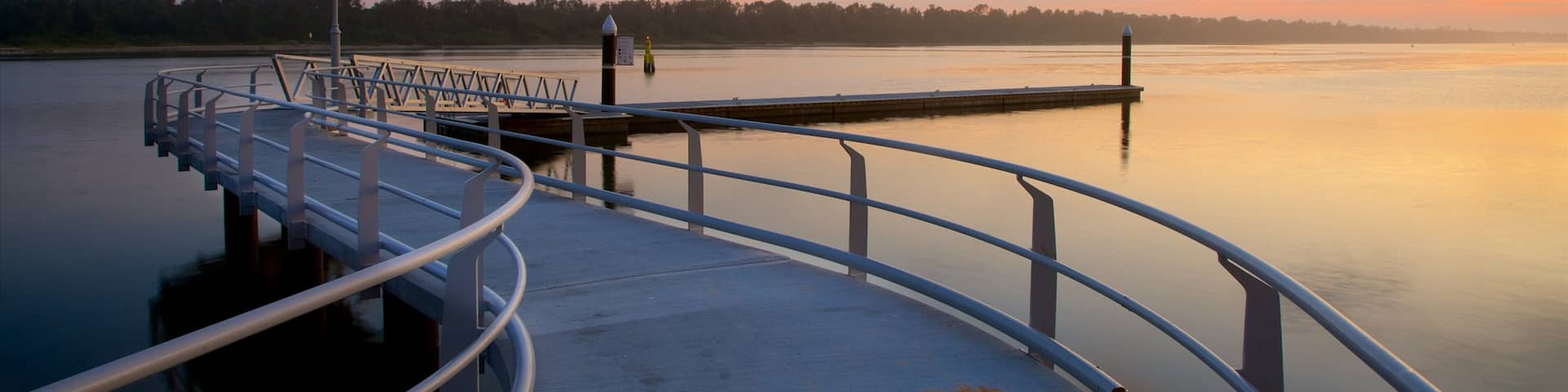 Lakes Entrance which includes a sunset and a bay or harbor