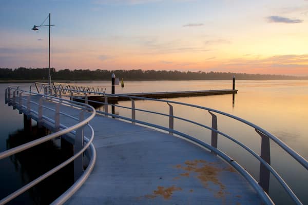 Lakes Entrance which includes a sunset and a bay or harbor