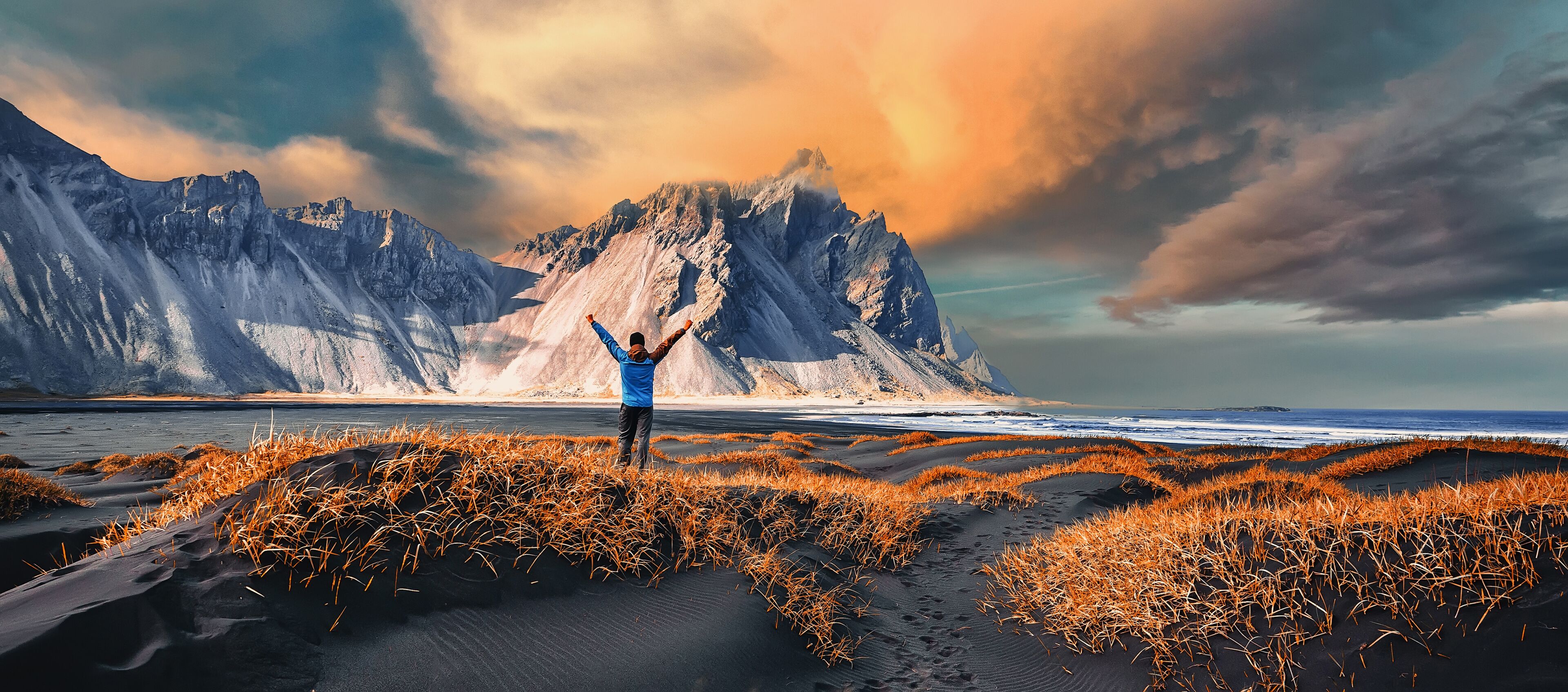 Impressive view of Vestrahorn mountaine on Stokksnes cape in Iceland during sunset. Amazing Iceland nature seascape. popular tourist attraction. Best famouse travel locations. Scenic Image of Iceland